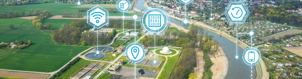 Dashboard of Netilion Network Insights in front of a water reservoir